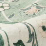 Covaba vintage botanical scalloped rug in fern green, styled in a room setting, view 2