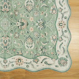 Covaba vintage botanical scalloped rug in fern green, styled in a room setting
