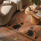 Covaba ancient egyptian revival cat rug in faded rose, styled in a room setting