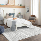 Covaba modern rustic farmhouse moroccan tribal grey/white area rug in soft white, styled in a room setting, view 3