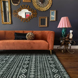 Covaba modern rustic farmhouse moroccan tribal black/white area rug in soft white, styled in a room setting, view 2