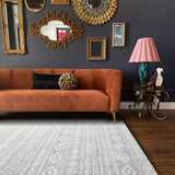 Covaba modern rustic farmhouse moroccan tribal grey/white area rug in soft white, styled in a room setting, view 4