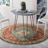 Covaba boho vintage tribal round rug in burnt rust, styled in a room setting, view 5
