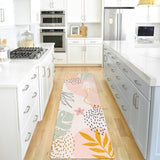 Covaba modern botanical leaf runner rug in blush clay, styled in a room setting, view 2