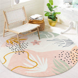 Covaba modern botanical leaf round rug in blush clay, styled in a room setting, view 3