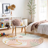 Covaba modern botanical leaf round rug in blush clay, styled in a room setting, view 7