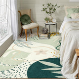 Covaba modern botanical leaf area rug in fern green, styled in a room setting, view 12