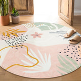 Covaba modern botanical leaf round rug in blush clay, styled in a room setting, view 8