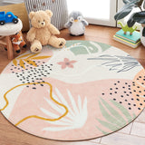 Covaba modern botanical leaf round rug in blush clay, styled in a room setting, view 6