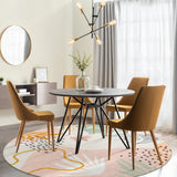 Covaba modern botanical leaf round rug in blush clay, styled in a room setting, view 9