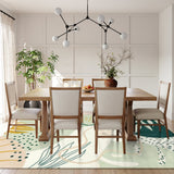 Covaba modern botanical leaf area rug in fern green, styled in a room setting, view 6