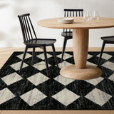 Covaba modern geometric diamond checkered area rug in ink black, styled in a room setting, view 6