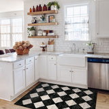 Covaba modern geometric diamond checkered doormat in ink black, styled in a room setting, view 5
