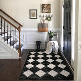 Covaba modern geometric diamond checkered doormat in ink black, styled in a room setting, view 6
