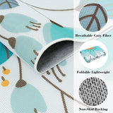 Covaba floral indoor outdoor rug in stormy blue, styled in a room setting