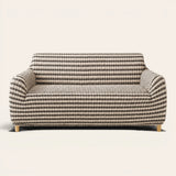 Black & Sand Bubble sofa cover on a plain studio background