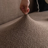 Brown Chenille sofa cover seen from the side on a corner sofa, view 2