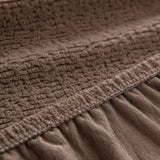 Brown Chenille sofa cover, woven texture in close-up