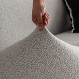 Pearl Grey Chenille sofa cover seen from the side on a corner sofa, view 3