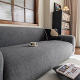 Stone Grey Chenille sofa cover covering the arm and seat of a sectional, view 4