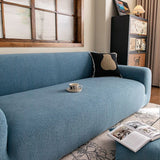 Stormy Blue Chenille sofa cover covering the arm and seat of a sectional