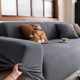 Grey Corduroy sofa cover shown across the seat and backrest of a two-seater