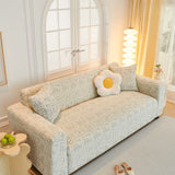 Boucle-Style Sand Jacquard sofa cover covering the arm and seat of a sectional, view 2