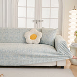 Stormy Blue Jacquard sofa cover seen from the side on a corner sofa