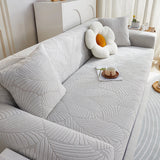 Pearl Grey Palm Relief sofa cover seen from the side on a corner sofa, view 2