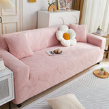 Pink Palm Relief sofa cover draped over a three-seater sofa in a bright living room, view 3
