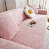 Pink Palm Relief sofa cover seen from the side on a corner sofa, view 3