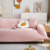 Pink Palm Relief sofa cover shown across the seat and backrest of a two-seater, view 3