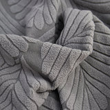 Stone Grey Palm Relief sofa cover covering the arm and seat of a sectional, view 4