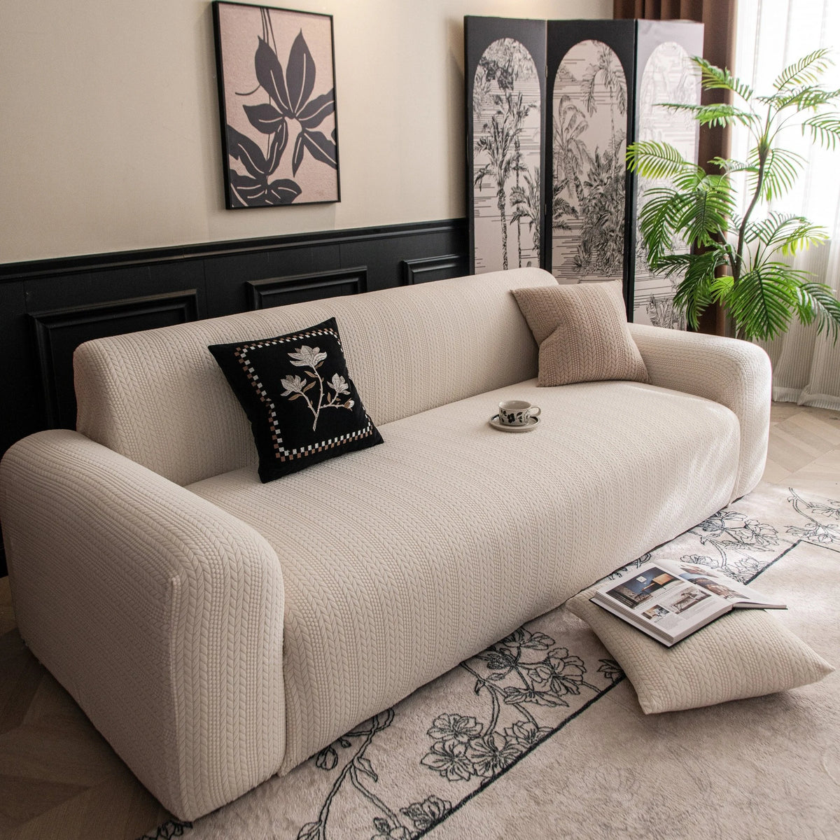 Ivory Cream Pinstripe Knit sofa cover draped over a three-seater sofa in a bright living room