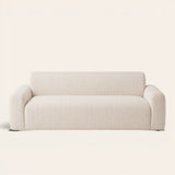 Ivory Cream Pinstripe Knit sofa cover on a plain studio background