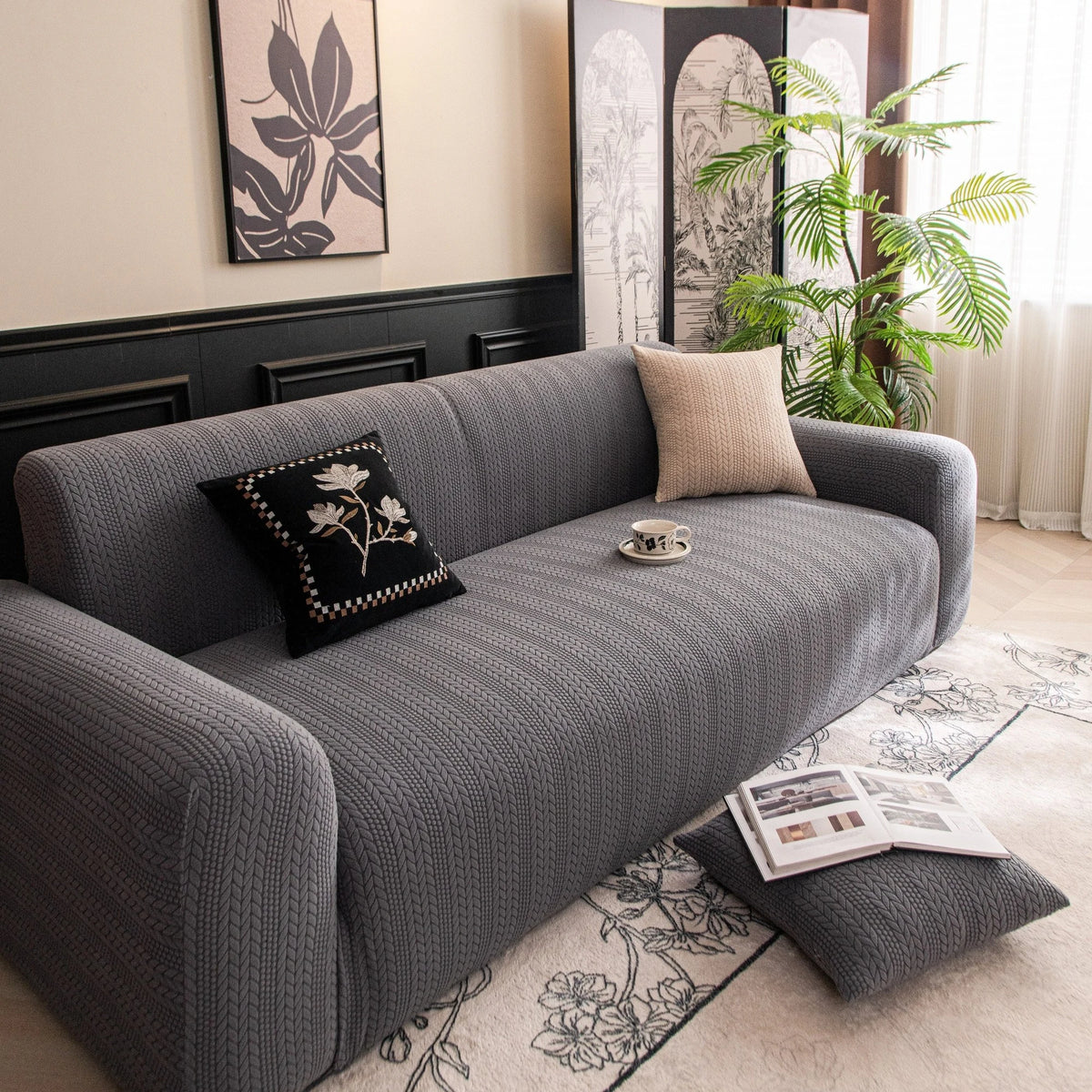 Stone Grey Pinstripe Knit sofa cover draped over a three-seater sofa in a bright living room, view 3