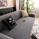 Stone Grey Pinstripe Knit sofa cover seen from the side on a corner sofa, view 3