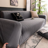 Stone Grey Pinstripe Knit sofa cover shown across the seat and backrest of a two-seater, view 3