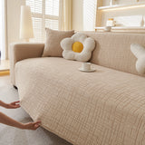 Boucle-Style Sand Quilted Waffle sofa cover seen from the side on a corner sofa, view 5
