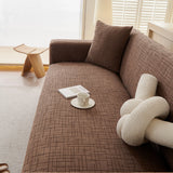 Brown Quilted Waffle sofa cover shown across the seat and backrest of a two-seater, view 2