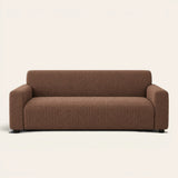 Brown Quilted Waffle sofa cover on a plain studio background, view 2