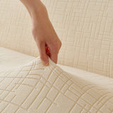Cream Beige Quilted Waffle sofa cover shown across the seat and backrest of a two-seater