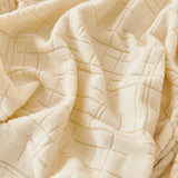 Cream Beige Quilted Waffle sofa cover, woven texture in close-up