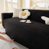 Ink Black Quilted Waffle sofa cover seen from the side on a corner sofa, view 4