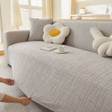 Pearl Grey Quilted Waffle sofa cover seen from the side on a corner sofa, view 3
