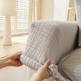 Pearl Grey Quilted Waffle sofa cover styled with cushions on a low-back sofa, view 3