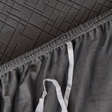 Stone Grey Quilted Waffle sofa cover covering the arm and seat of a sectional, view 2