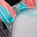 Elasticated hem and reverse side of the sky mist watercolor triangles sofa cover
