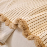 Oat Beige Corduroy sofa throw styled with cushions on a low-back sofa