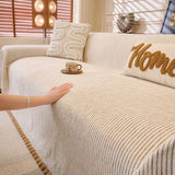 Oat Beige Corduroy sofa throw covering the arm and seat of a sectional